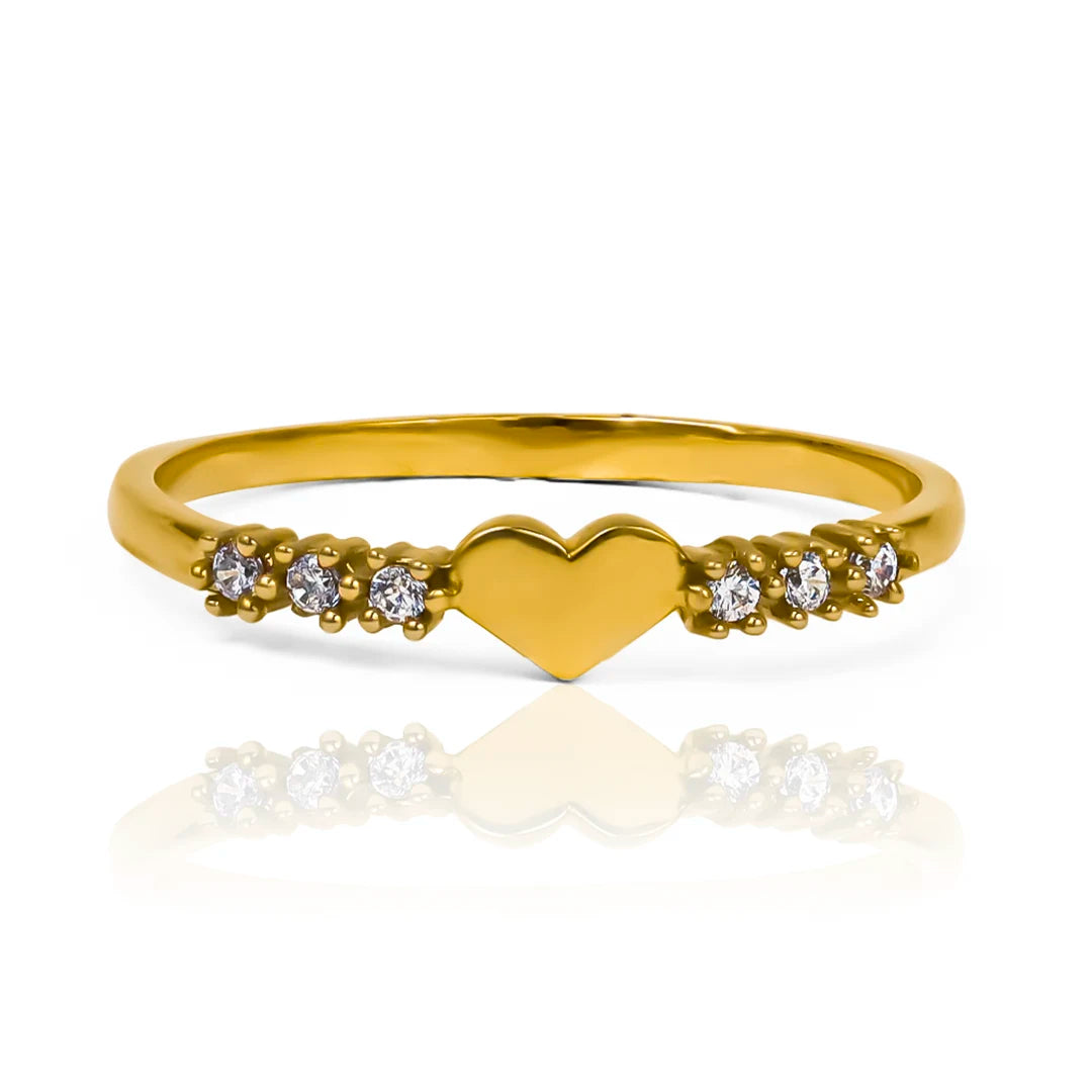 Anillo "Heart Between" de Joyería Caracas es una verdadera obra de arte. Fabricado en oro 18k, cuenta con garantía de por vida. 