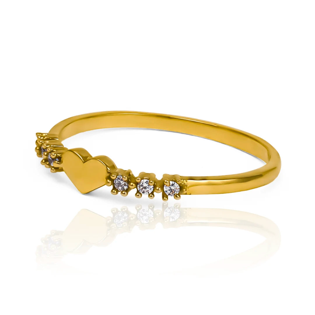 Anillo "Heart Between" de Joyería Caracas es una verdadera obra de arte. Fabricado en oro 18k, cuenta con garantía de por vida.