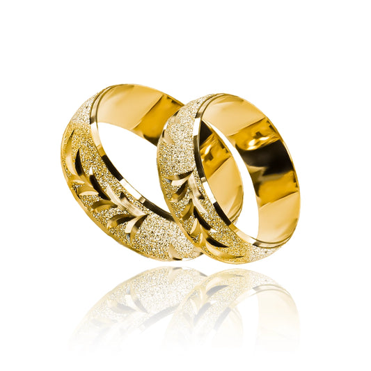 Celebra tu amor con las exclusivas Argollas de matrimonio Twigs. Están hechas a mano en oro de 18K por los artesanos de Joyería Caracas. 