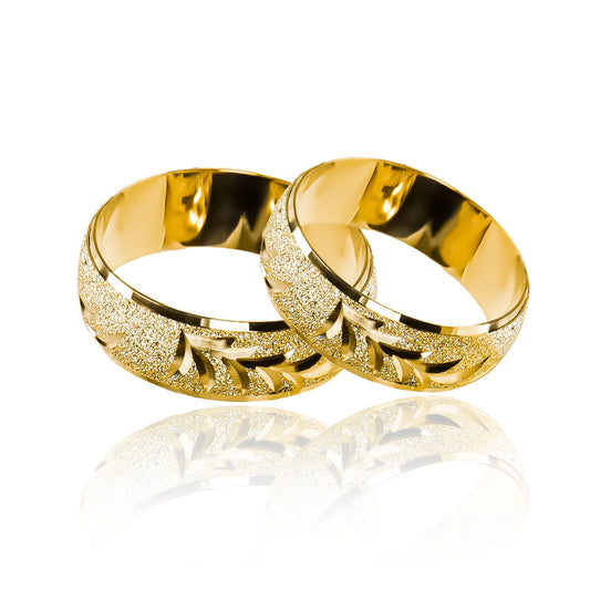 Celebra tu amor con las exclusivas Argollas de matrimonio Twigs. Están hechas a mano en oro de 18K por los artesanos de Joyería Caracas. 