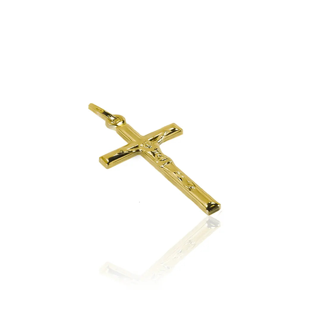 Dije Cruz Cristo M I hecho en oro 18K es una verdadera joya de la reconocida Joyería Caracas. Con su elegante diseño y garantía para toda la vida.