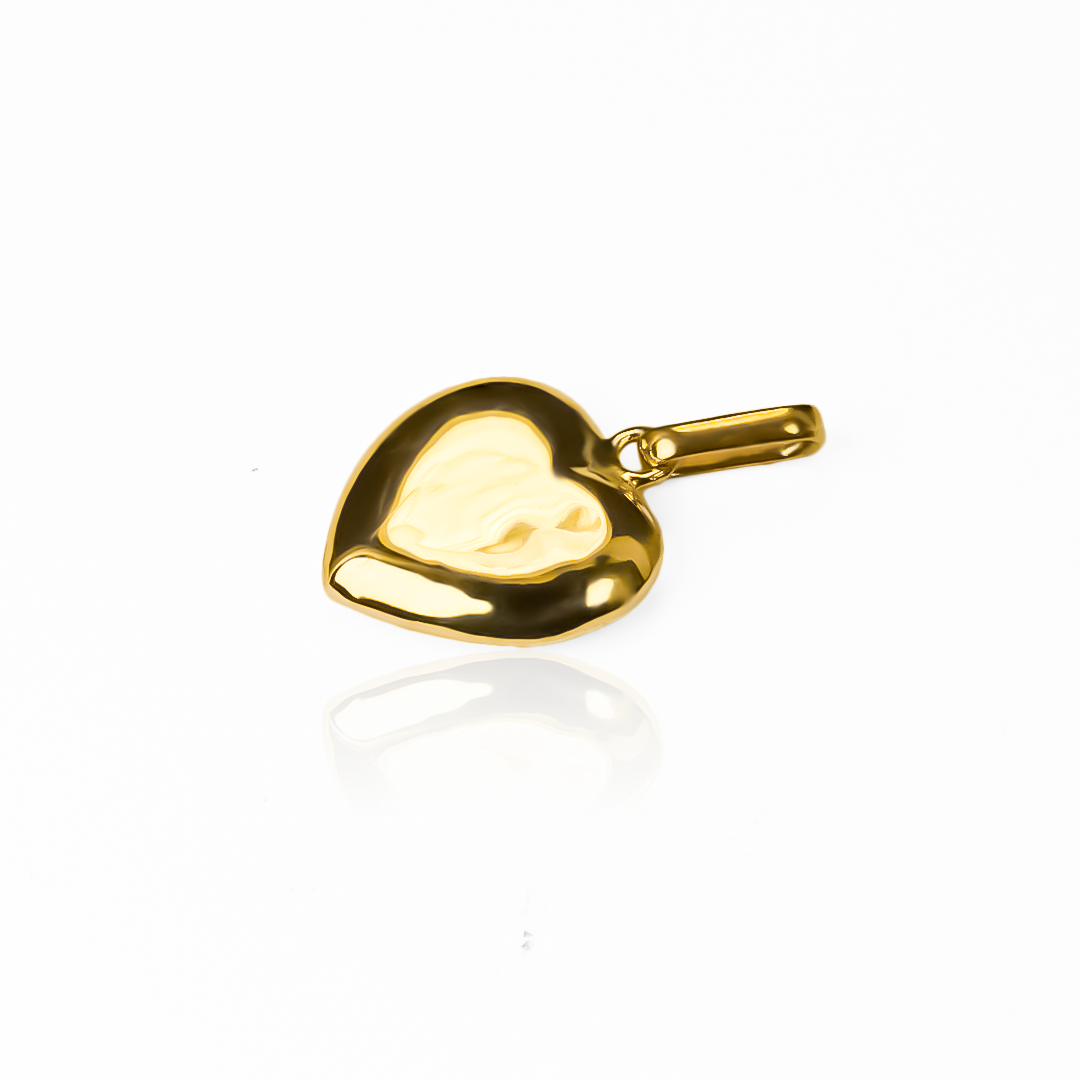 El Dije Corazón Soplado L JT es una joya única y exclusiva con una cubierta de oro 18K, que proviene directamente de Joyería Caracas. Con garantía para toda la vida, esta hermosa pieza es un símbolo de amor y elegancia que perdurará por siempre. Eleva tu estilo con este dije sofisticado y de alta calidad.