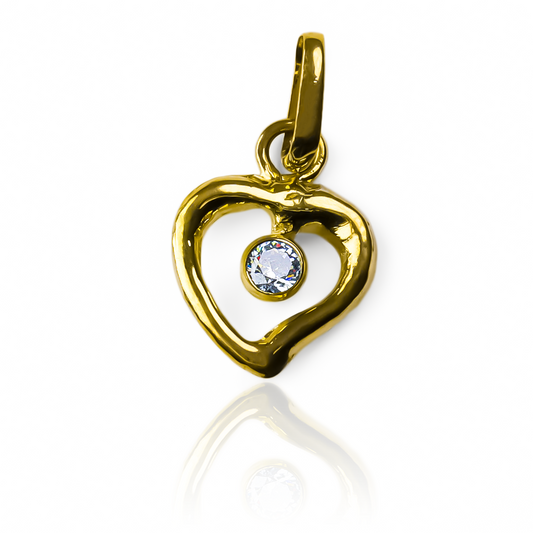 Descubre la belleza eterna con nuestro dije de corazón cristal SS JT, bañado en oro de 18K. Hecho por Joyería Caracas, con garantía de por vida. Una pieza de lujo que refleja amor y elegancia en cada detalle. Haz una declaración de sofisticación con este dije.