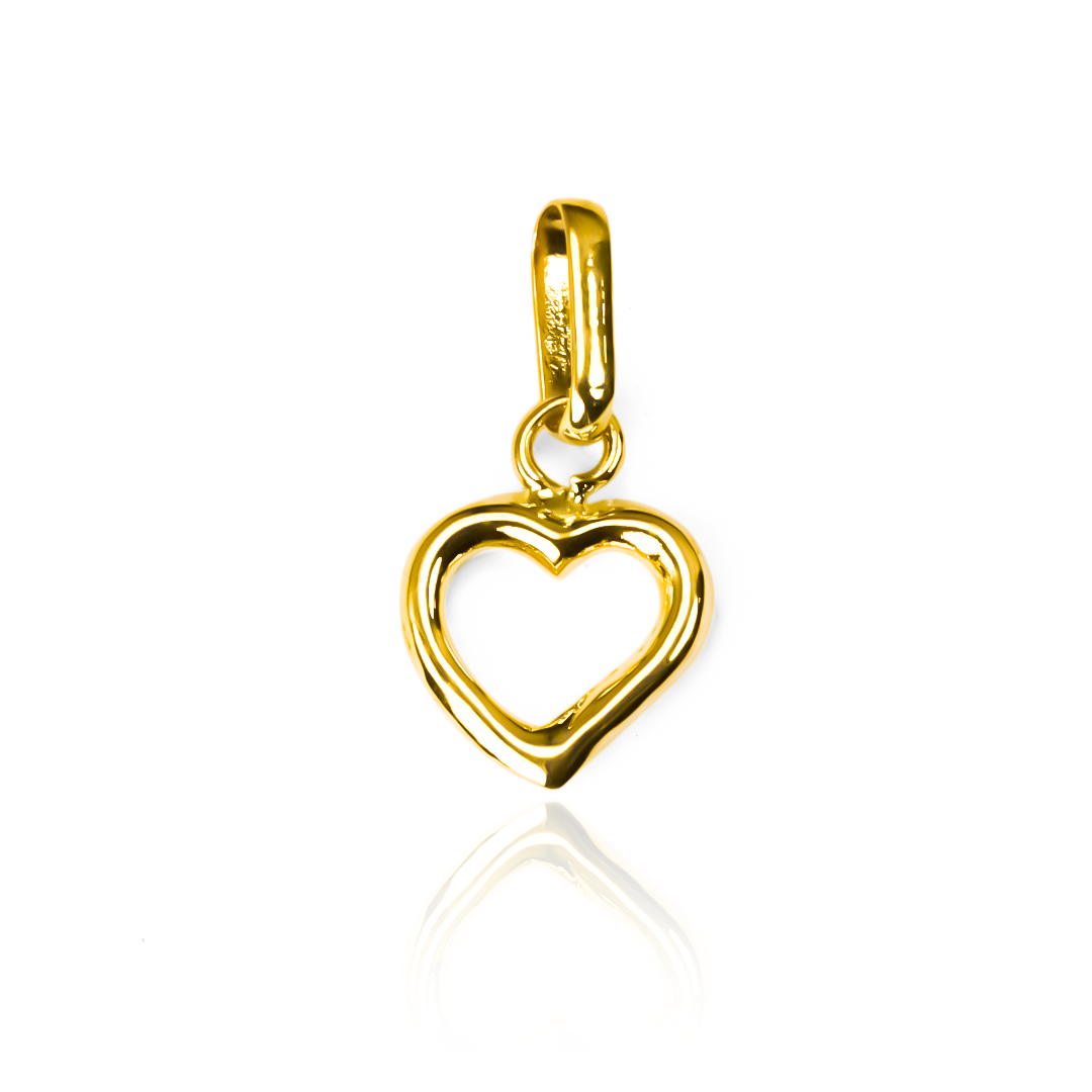 Descubra la elegancia y el lujo del Dije Corazón liso S JT. Bañado en oro de 18K y con la calidad excepcional de Joyería Caracas, este dije es una pieza única. Además, cuenta con garantía de por vida, asegurando su durabilidad y valor para siempre.