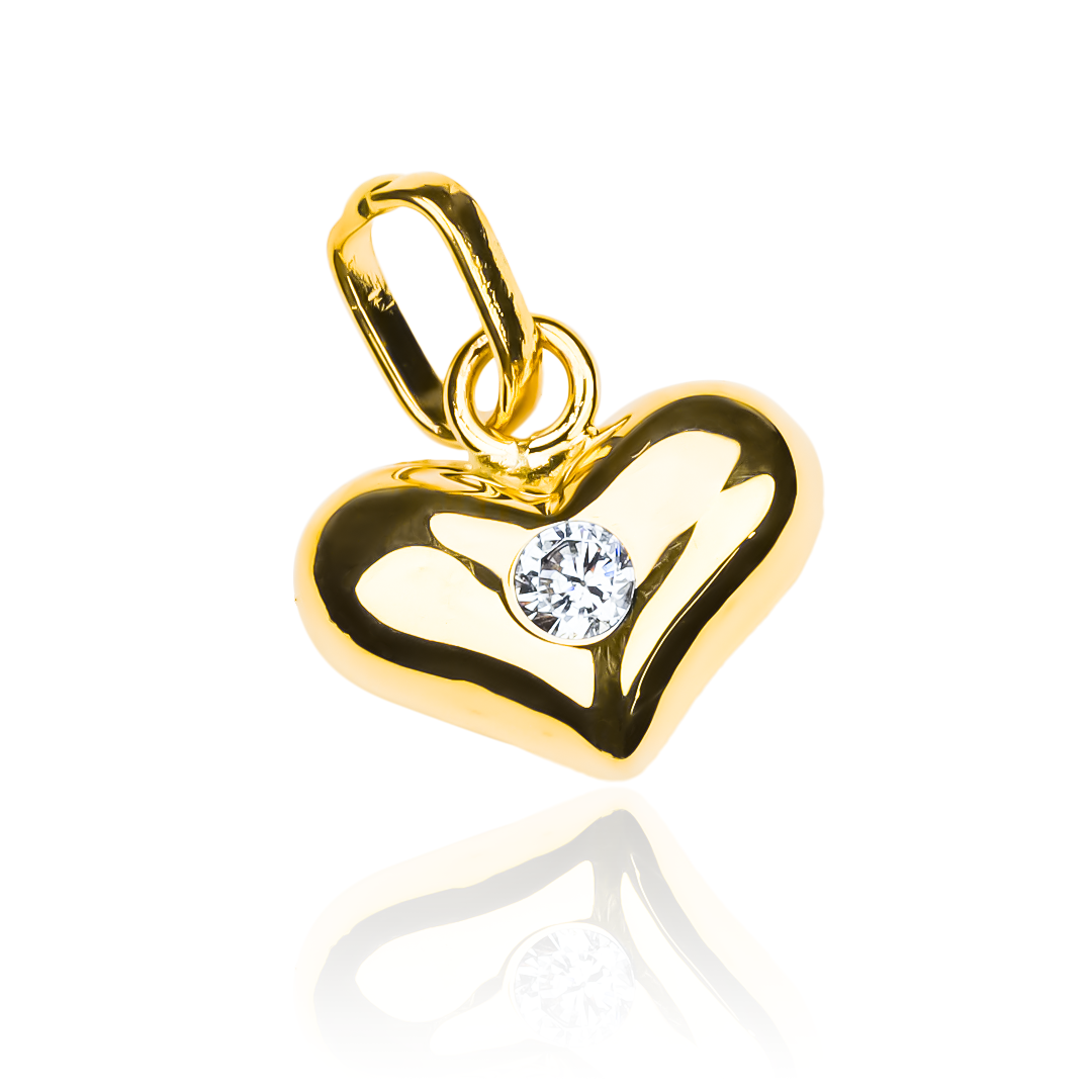 Agregue un toque de elegancia y lujo a su atuendo con nuestro Dije Corazón soplado con centro de cristal. Hecho de oro 18K y diseñado por Joyería Caracas, esta pieza única es una adición imprescindible a su colección. Incluye garantía de por vida para asegurar su belleza duradera.