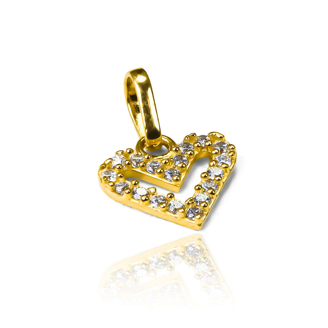 Disfruta de la elegante belleza de nuestro Dije Corazón estilo cristal JT, elaborado en Oro 18K por Joyería Caracas. Con garantía de por vida, este dije es perfecto para lucir en cualquier ocasión y añadir un toque exclusivo a tu estilo. Una pieza lujosa y única que será el corazón de tu colección de joyas.