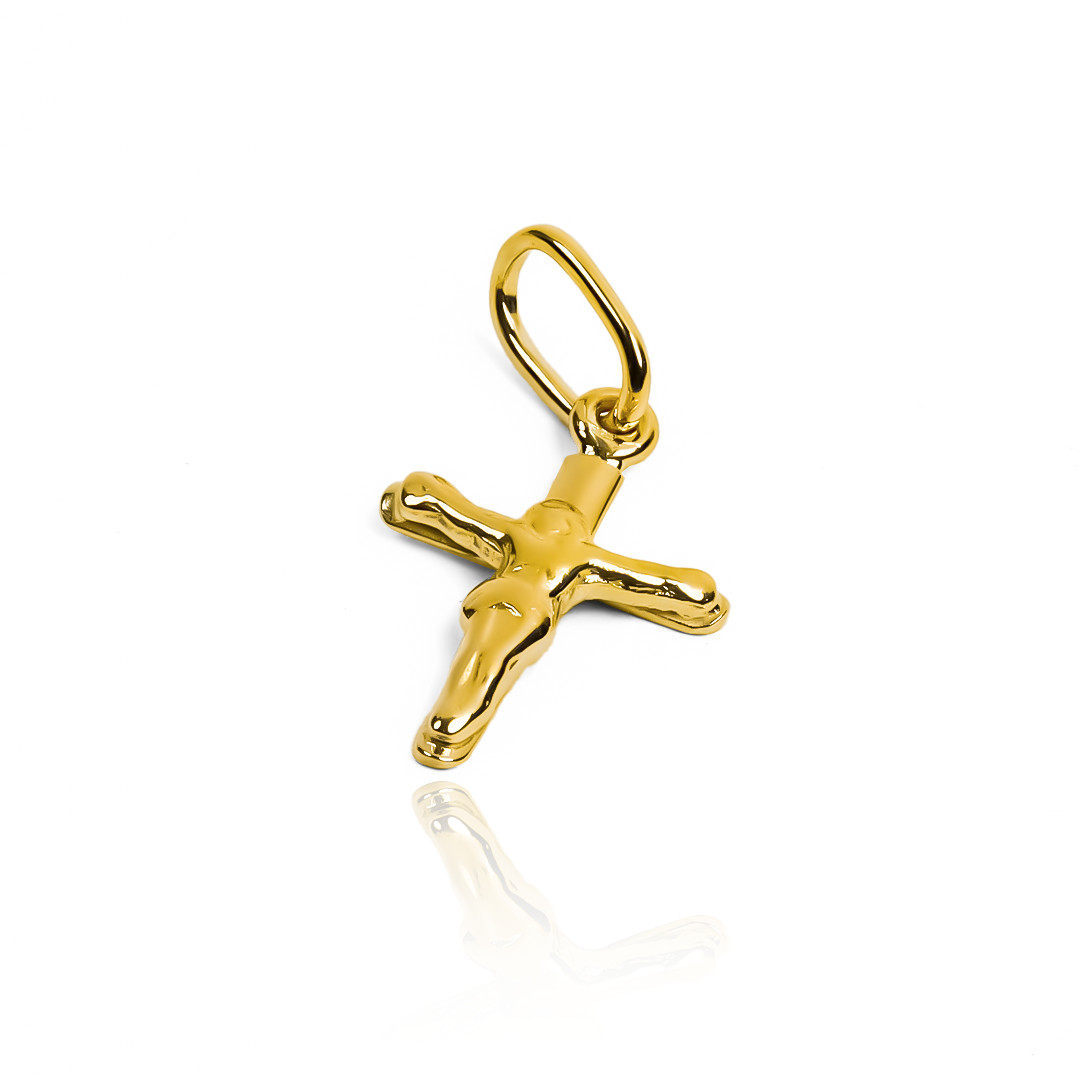 Dije Cruz Cristo XS JC, una joya de oro 18K de la prestigiosa joyería Caracas. Su elegante diseño con el símbolo del cruz cristiana, es perfecto para complementar cualquier atuendo con un toque de exclusividad. Con garantía de por vida, este dije es una inversión que durará para siempre.