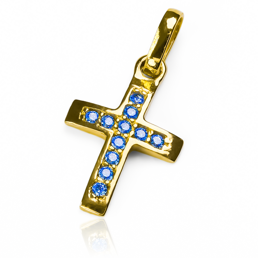 Nuestro Dije Cruz cristal media caña blue es una obra de arte en sí mismo. Con detalles en Oro 18K y la calidad de Joyería Caracas, este dije es una adición elegante a cualquier colección de joyas. Con nuestra garantía para toda la vida, este dije es un tesoro que trascenderá generaciones.