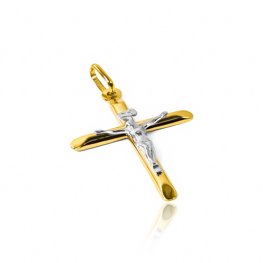 Disfruta de la elegancia y exclusividad con el Dije Cruz cristo M medio tubo bicolor I, hecho con Oro 18K y respaldado por la prestigiosa Joyería Caracas. Con garantía para toda la vida, es una inversión en estilo y calidad sin igual.