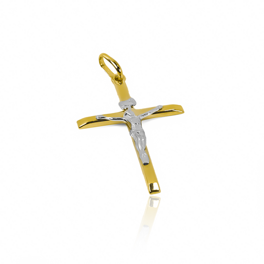 Disfruta de la elegancia y exclusividad del Dije Cruz cristo plano II L bicolor. Con diseño en Oro 18K de la prestigiosa Joyería Caracas y una garantía para toda la vida, este dije es la perfecta combinación de lujo y calidad que te acompañará por siempre.