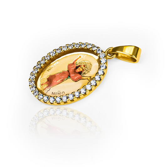 Descubre la elegancia y belleza del Dije Divino niño PINK cristal I. Hecho de oro 18K y cuidadosamente diseñado por Joyería Caracas, este dije es un símbolo de protección y devoción. Con garantía de por vida, es la combinación perfecta de lujo y significado.