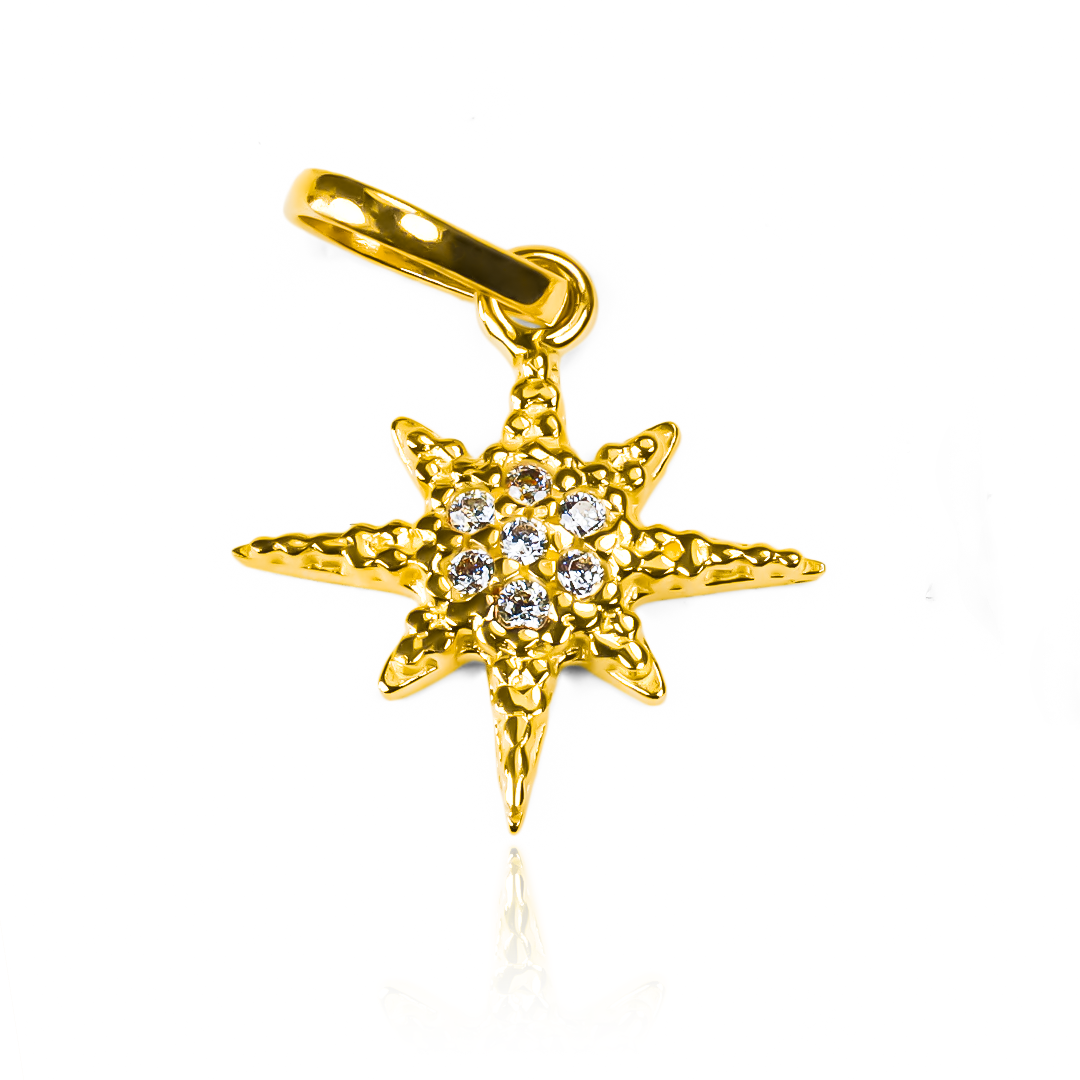 Descubre la elegancia y la sofisticación en nuestro dije Estrella centro de cristales JT. Confeccionado en oro 18K, este diseño de Joyería Caracas es una pieza exclusiva y de alta calidad. Con garantía de por vida, es la elección perfecta para un estilo de vida lujoso y duradero.