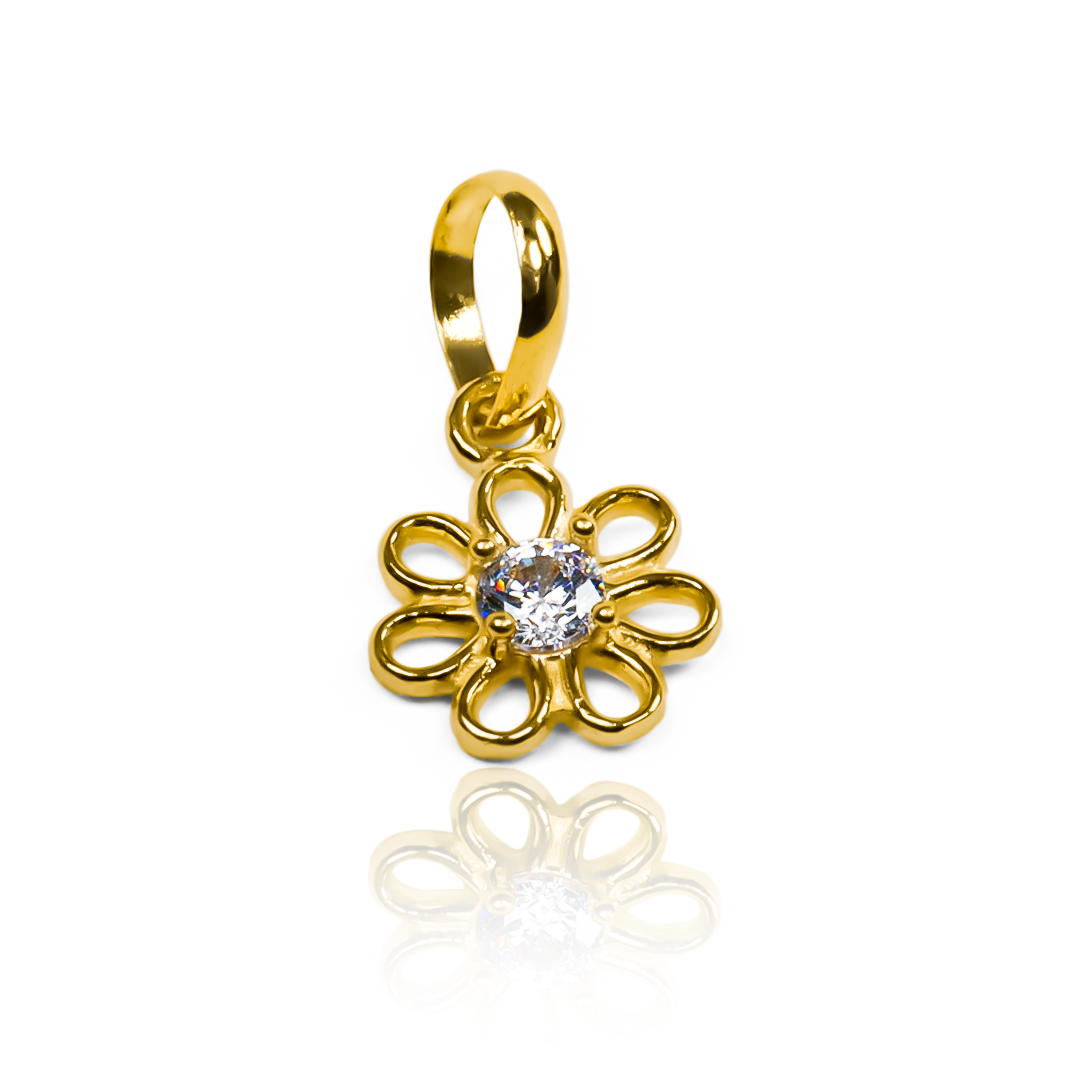 Disfruta de la elegancia y exclusividad con nuestro dije Flor pétalos calados JT, elaborado en oro 18K por la prestigiosa Joyería Caracas. Con garantía para toda la vida, este dije es una verdadera obra de arte que te acompañará y realzará tu estilo para siempre.