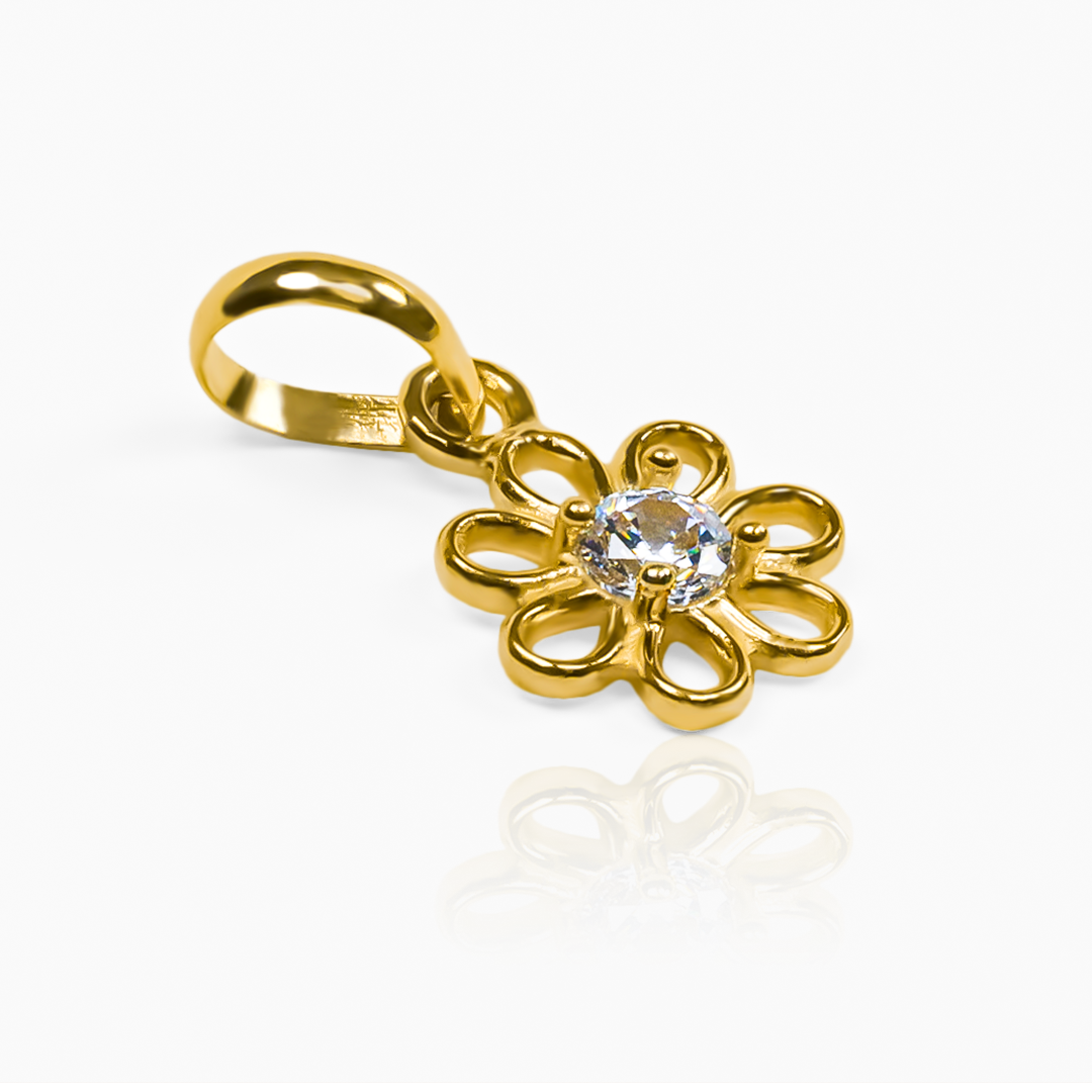 Disfruta de la elegancia y exclusividad con nuestro dije Flor pétalos calados JT, elaborado en oro 18K por la prestigiosa Joyería Caracas. Con garantía para toda la vida, este dije es una verdadera obra de arte que te acompañará y realzará tu estilo para siempre.