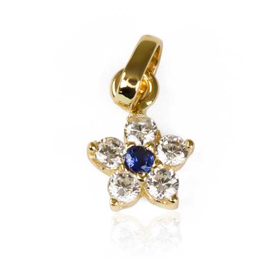 Deslumbra con la elegancia y sofisticación del dije Flor cristal blue JT SM. Fabricado en Oro 18K y con la garantía de Joyería Caracas, este dije es una verdadera obra de arte. Su belleza y calidad lo convierten en una pieza única que perdurará toda la vida.