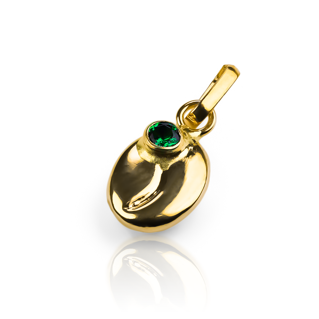 Agregue un toque de elegancia con el dije Grano de café M cristal green JT. De oro 18K y con la exclusividad de Joyería Caracas. Con garantía de por vida, será una pieza única y duradera en su colección.