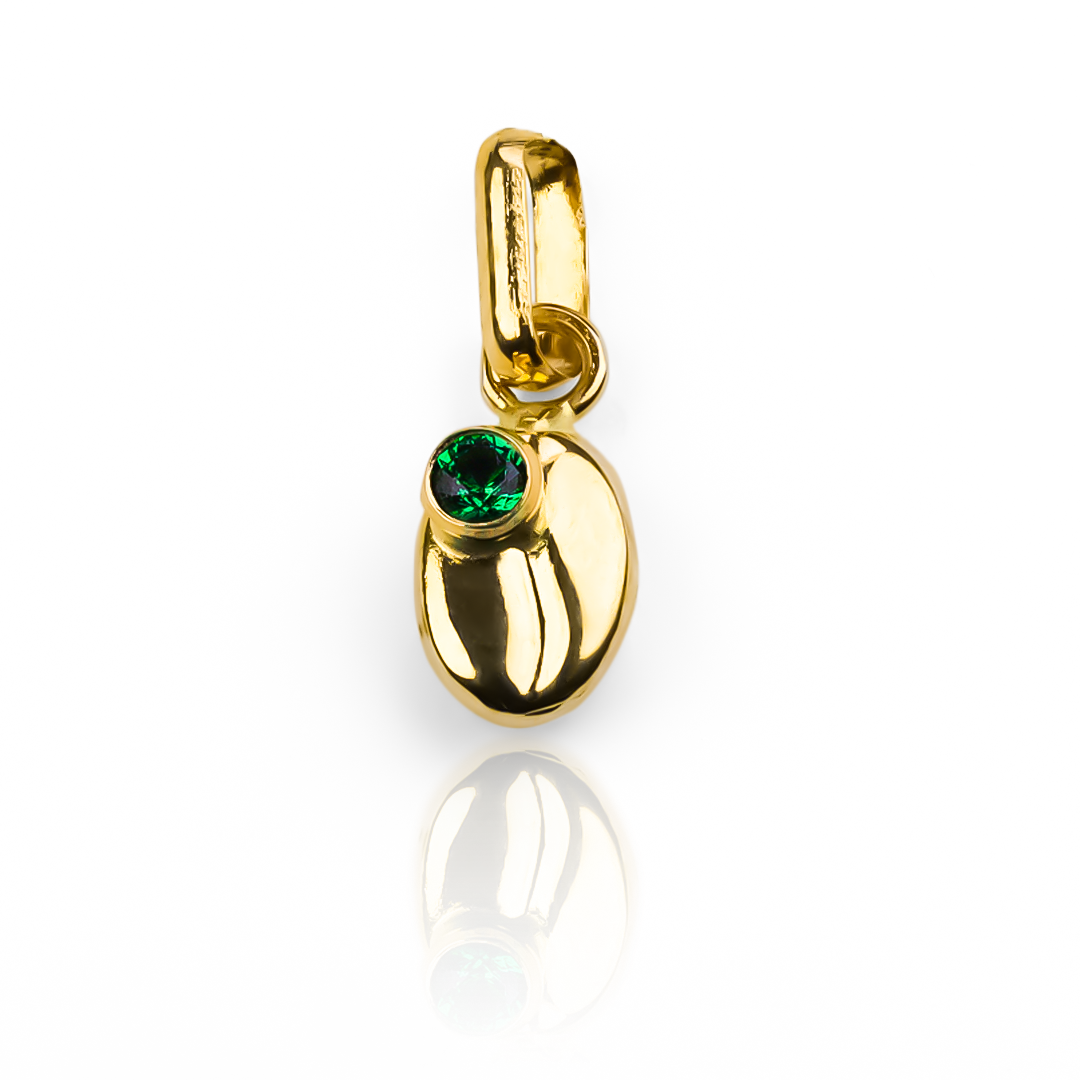 Disfruta de lujo y elegancia con nuestro Dije Grano de café S cristal green JT. Hecho con oro 18K y con la calidad de Joyería Caracas, este dije asegura estilo y durabilidad. Con garantía de por vida, es una pieza atemporal que te acompañará en cada ocasión.