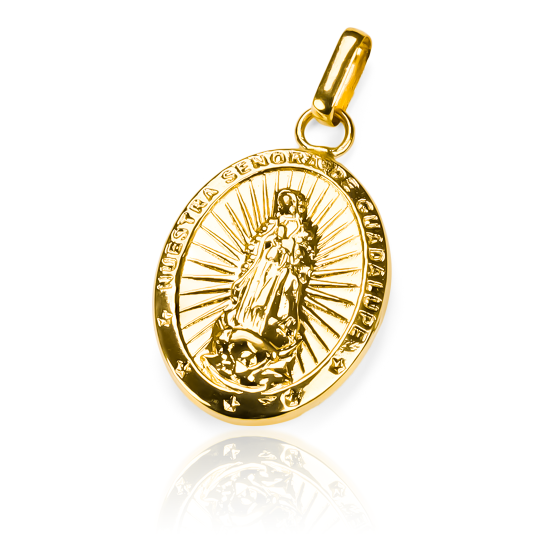 Descubre la elegancia y exclusividad de nuestro dije Guadalupe XXL JT con acabado en oro 18K. Con diseño de la prestigiosa Joyería Caracas y respaldado por una garantía de por vida, asegura un toque de lujo para siempre. Descubre la eternidad en una pieza.