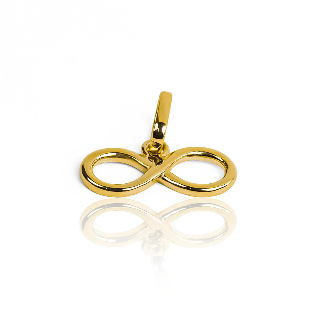 Descubre el lujo eterno con nuestro Dije Infinito Liso Jc. Hecho con oro 18K y diseñado por Joyería Caracas, este dije te asegura elegancia y calidad duradera. Con garantía para toda la vida, es una pieza exclusiva que te acompaña en cada momento de tu vida.