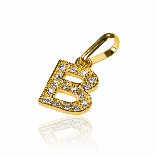 Descubre la elegancia de nuestro Dije Letra B crystal JT en oro de 18K. Diseñado por Joyería Caracas y con garantía para toda la vida, este accesorio es un símbolo de lujo y exclusividad. Convierte tu estilo en una obra de arte con este dije único.