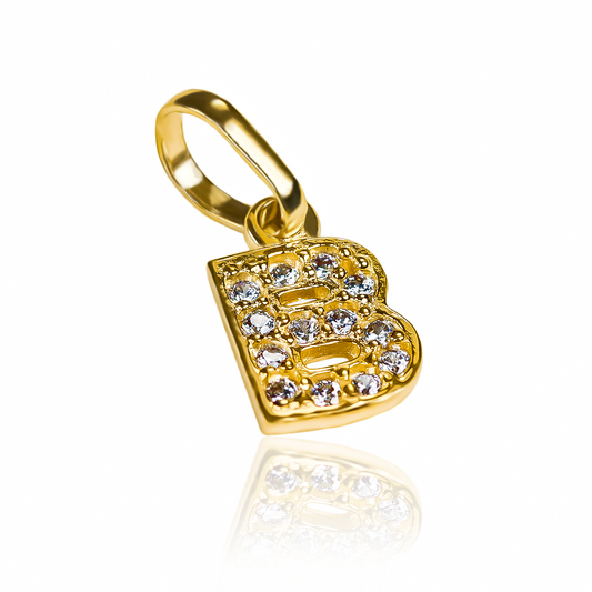 Descubre la elegancia de nuestro Dije Letra B crystal mini JT. Hecho de oro 18K y diseñado por Joyería Caracas, cada pieza es única y viene con garantía de por vida. Haz una declaración sofisticada con este dije exclusivo.