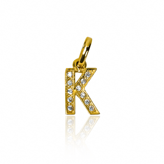 Sé la envidia de todos con este elegante Dije Letra K crystal JT. Confeccionado en oro 18K de alta calidad y garantía para toda la vida, esta joyería de Caracas es una pieza exclusiva que te hará destacar. Luce tu estilo con este símbolo de lujo y sofisticación.