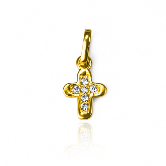 Luce sofisticada y elegante con el Dije Mini cruz cristales curva JT en oro 18K de Joyería Caracas. Con impresionantes cristales curvos y una garantía de por vida, esta pieza es un símbolo de lujo y exclusividad. Añade un toque de estilo a tu look con este dije único.