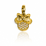 Descubre el encanto de este Dije Minnie con cristales JT en oro 18K. Hecho por Joyería Caracas con una garantía para toda la vida, esta pieza exclusiva es perfecta para añadir un toque de elegancia a cualquier atuendo. Una adición intemporal a tu colección de joyas de lujo.