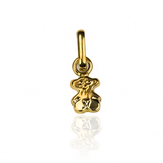 Disfruta de la elegancia y exclusividad de nuestro Dije Oso Miniatura en oro de 18K. Creada por Joyería Caracas, esta pieza traerá un toque de lujo a cualquier outfit. Y con nuestra garantía de por vida, tendrás la seguridad de que esta joya te acompañará para siempre.