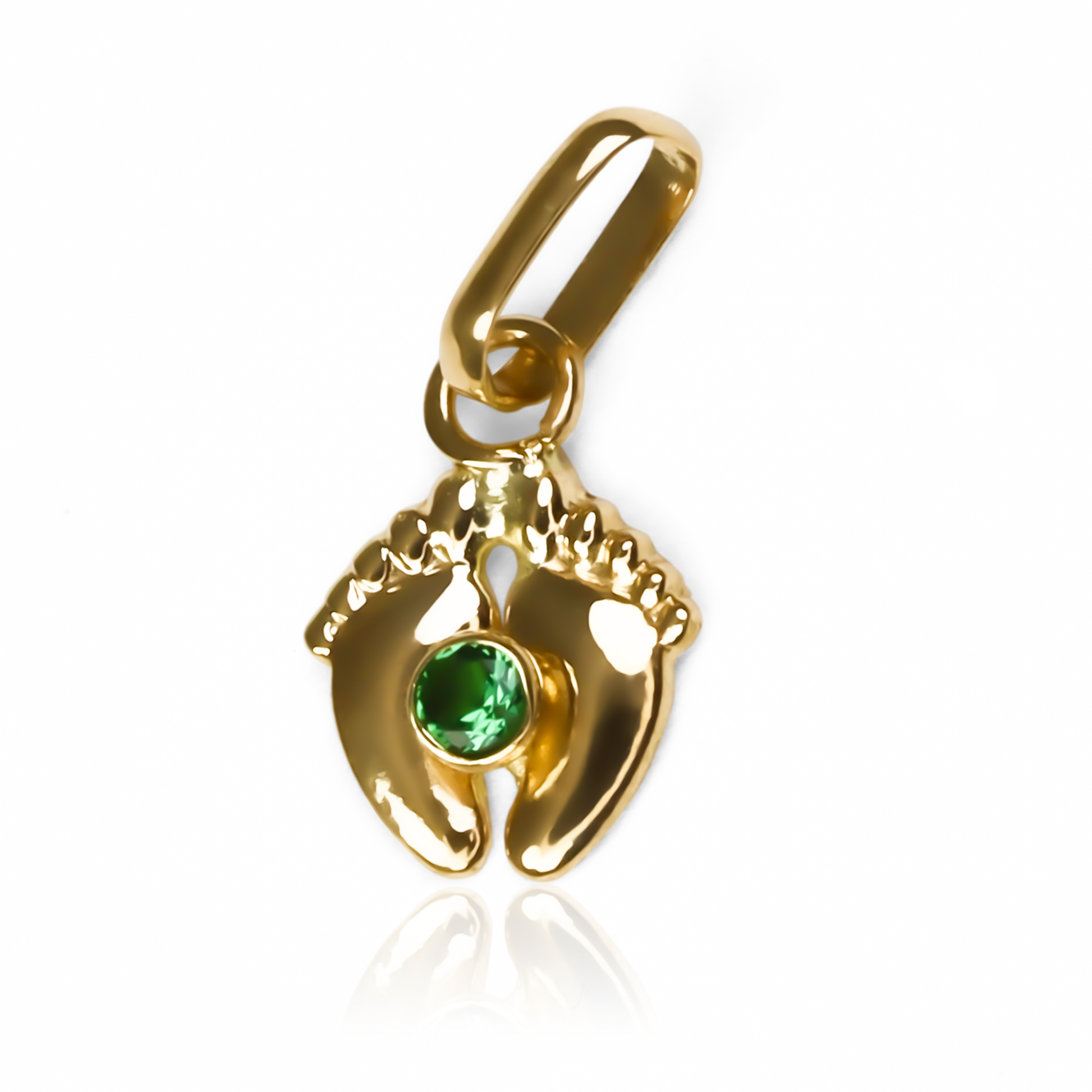 Déjate seducir por la elegancia y exclusividad de nuestro Dije Pies descalzos verde. Confeccionado con oro 18K de la prestigiosa Joyería Caracas, su garantía para toda la vida lo convierte en una inversión duradera. Eleva tus looks con un toque de sofisticación y estilo único.