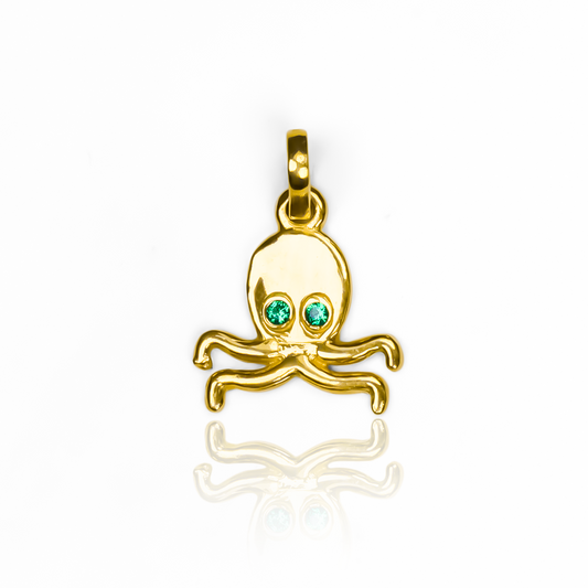 Descubre la elegancia y exclusividad de nuestro Dije Pulpo JT, hecho con oro de 18K de la prestigiosa Joyería Caracas. Con garantía para toda la vida, este dije es una inversión en estilo y calidad que te acompañará en todas tus aventuras.