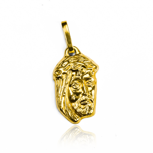 Dije Rostro M I E, un símbolo de elegancia y originalidad. Elaborado en oro 18K por Joyería Caracas. Garantía de por vida.