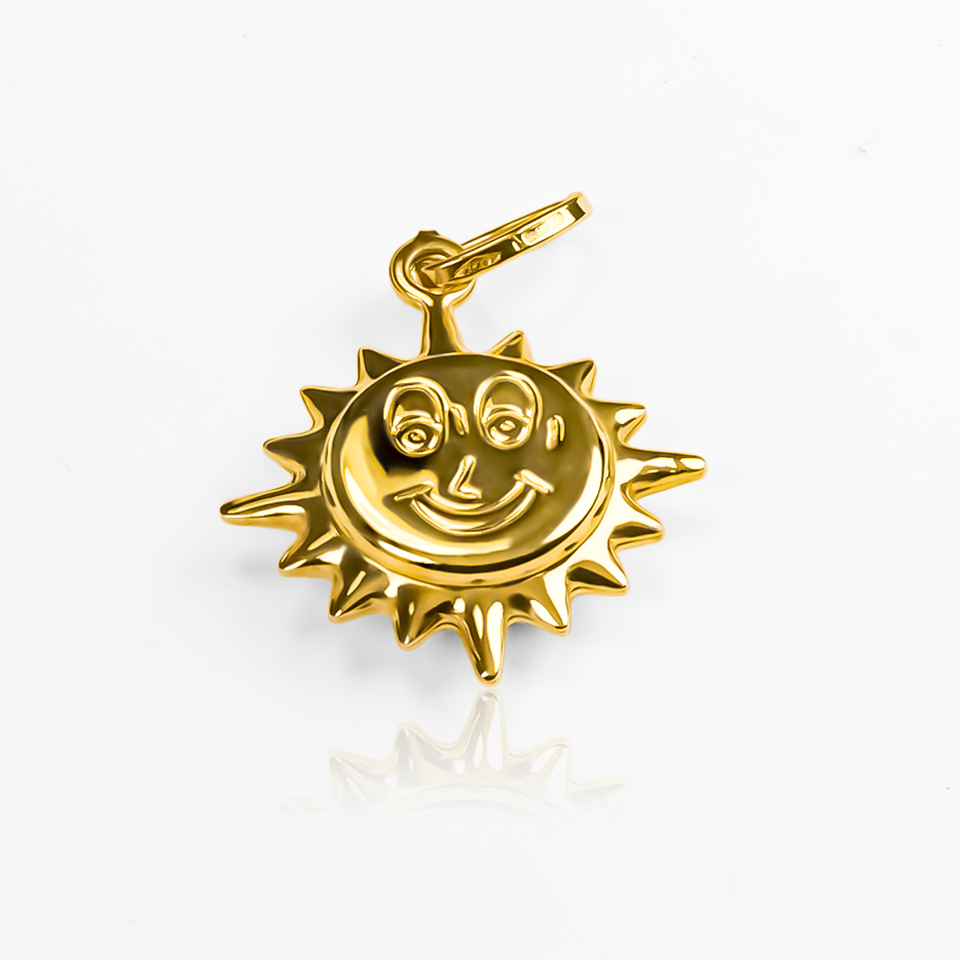 Descubre la elegancia y sofisticación de nuestro Dije Sol globo I. Confeccionado en oro 18K y diseñado por Joyería Caracas, es una pieza exclusiva y única que te acompañará para siempre. Vive la experiencia de la garantía para toda la vida y brilla con un estilo de lujo que perdurará por siempre.