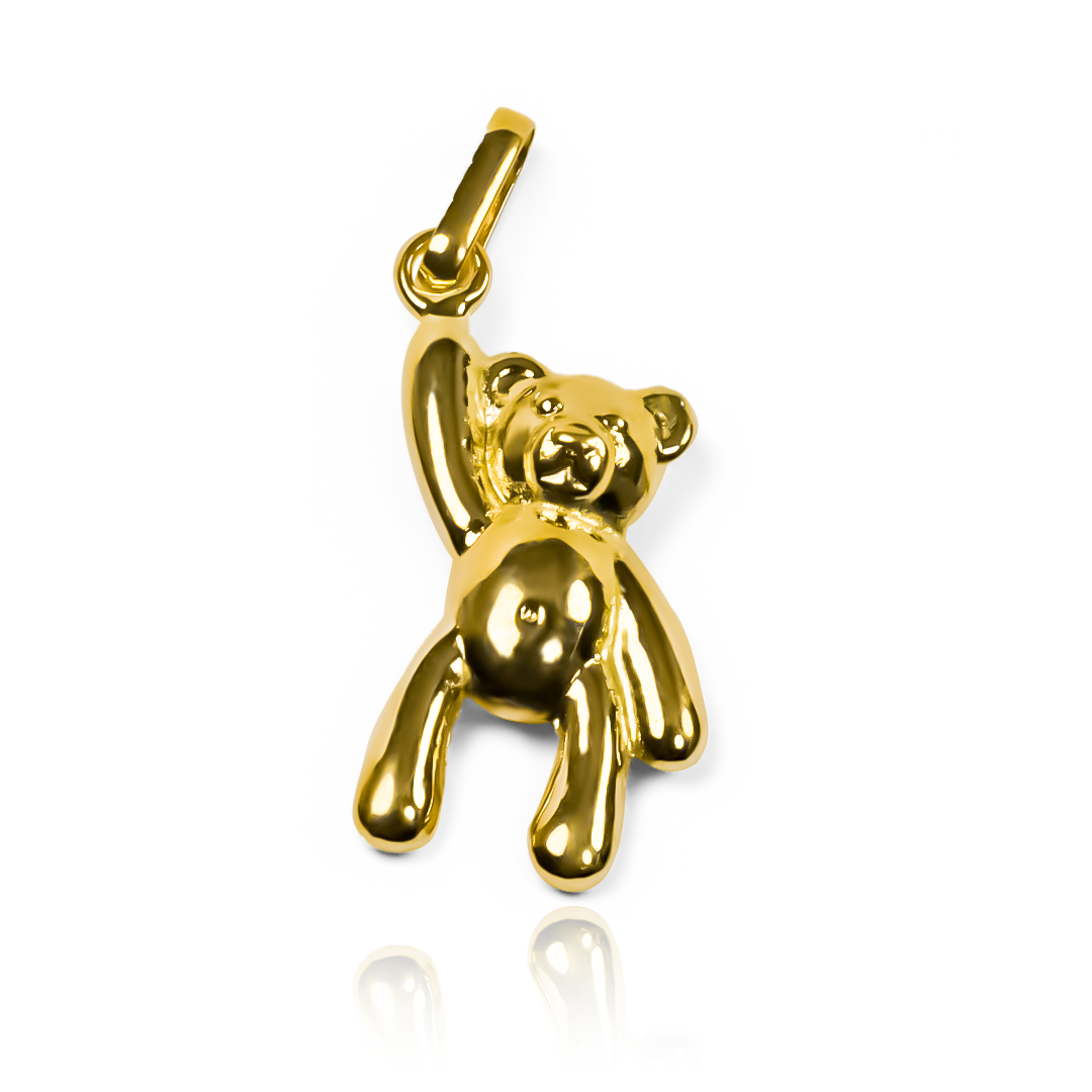 Admira el estilo exclusivo y sofisticado de nuestro Dije Teddy L JT. Confeccionado en oro 18K por Joyería Caracas y con garantía de por vida, este dije es una verdadera obra de arte. Llévalo contigo y brilla con elegancia y lujo en cada ocasión.