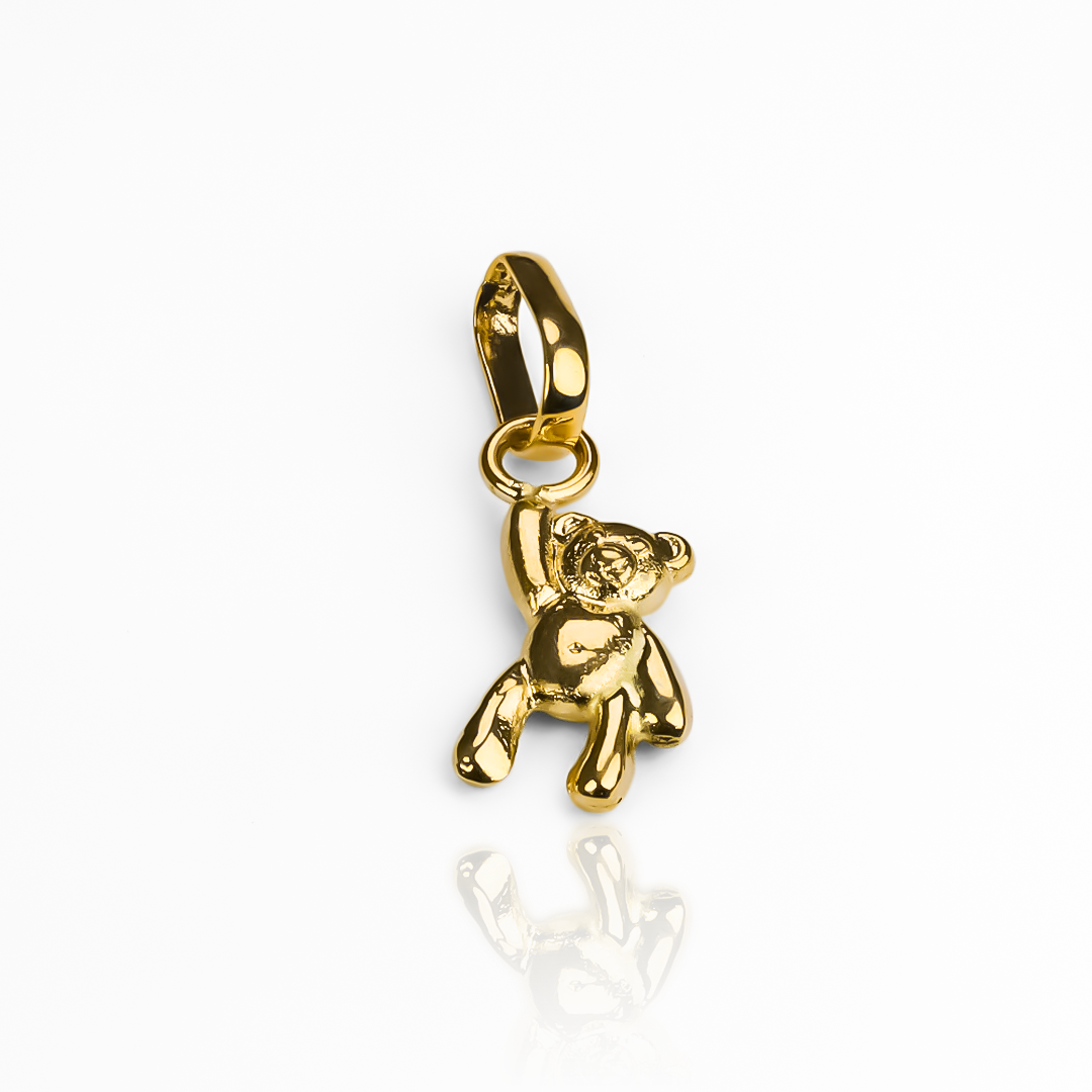 Descubre la elegancia de los Dije Teddy S JT de oro 18K de Joyería Caracas. Con una garantía para toda la vida, este exclusivo dije evoca la belleza atemporal y la calidad suprema. Una pieza imprescindible para los amantes de la sofisticación y el estilo.