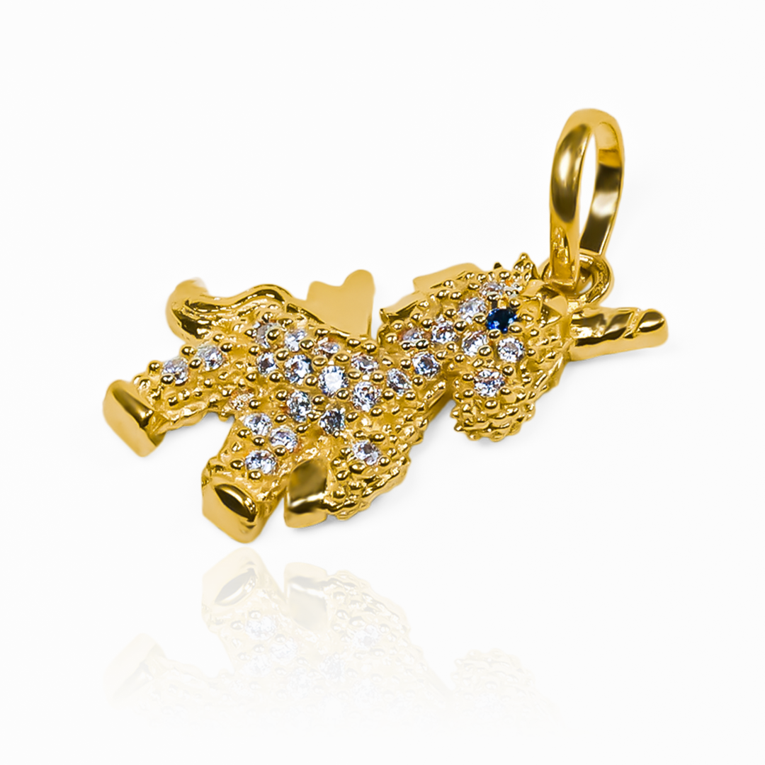 El Dije Unicornio cristales JT es una joya de oro 18K con un diseño exclusivo de Joyería Caracas. Cada cristal es cuidadosamente seleccionado para brindar un brillo único. Con garantía para toda la vida, esta pieza es una inversión en elegancia y sofisticación.