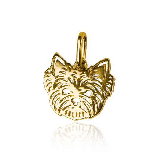 Disfruta de la elegancia y exclusividad que brinda el Dije Yorkie, elaborado con oro de 18K. Diseñado por Joyería Caracas, este dije es una joya atemporal con garantía de por vida. Sé el centro de atención con esta pieza sofisticada y duradera.