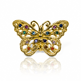 Descubre la exclusividad de Dije multicolor Butterfly JT. Confeccionado con oro 18k y diseñado por la prestigiosa Joyería Caracas, este dije es una verdadera obra de arte. Adorna cualquier atuendo y regala una garantía para toda la vida de elegancia y sofisticación.