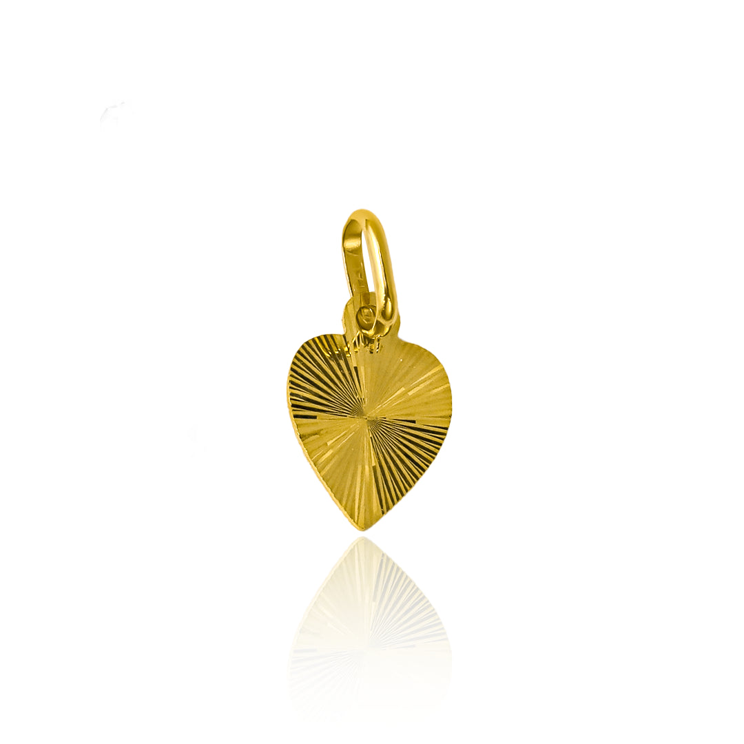 Dije corazón diamantado placa I en oro 18k. Este hermoso accesorio de Joyería Caracas y cuenta con garantía para toda la vida.