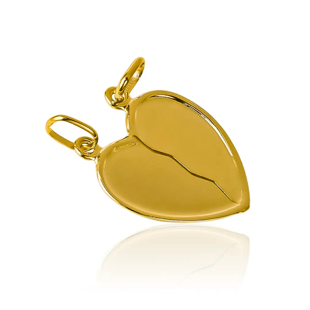 Dije Corazón dúo I, hecho de Oro 18K y diseñado por Joyería Caracas, con garantía para toda la vida.