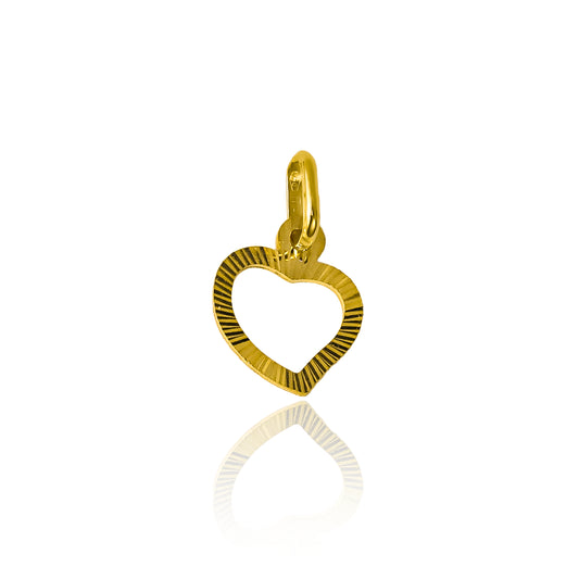 Dije corazón diamantado marco I en oro 18k. Este hermoso accesorio de Joyería Caracas, cuenta con garantía de por vida.