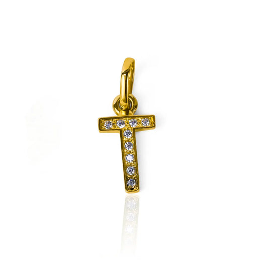 Dije Letra T crystal JT. Elaborado con Oro 18K y diseñado por Joyería Caracas, este dije ofrece la garantía para toda la vida, asegurando su calidad y durabilidad.