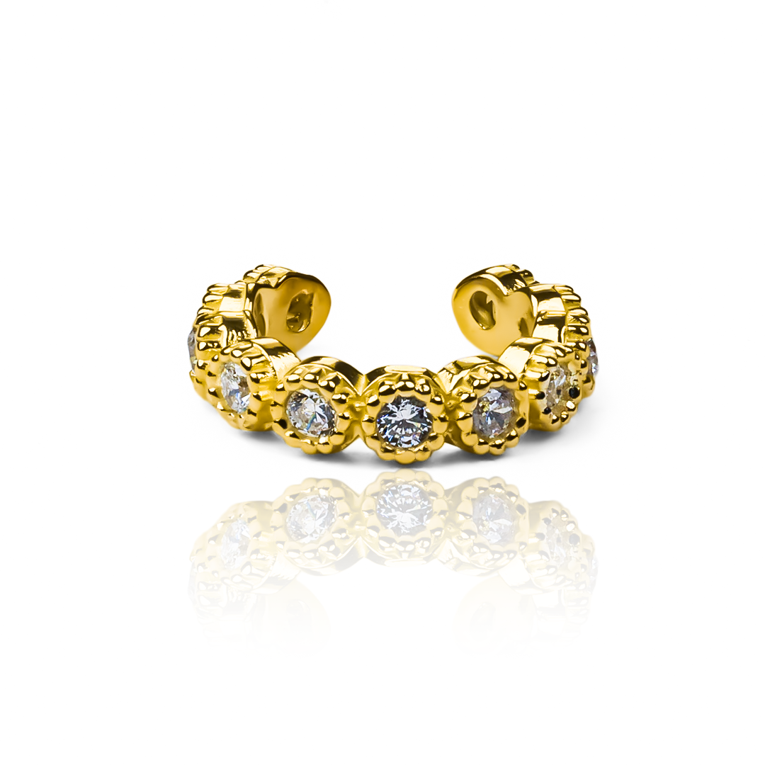 Este Earcuff caterpillar cristal es una joya de oro 18K de la exclusiva marca Joyería Caracas. Su diseño elegante y sofisticado simboliza la vida eterna y viene con una garantía para toda la vida. Añade un toque de lujo a tu estilo con esta pieza única y duradera.