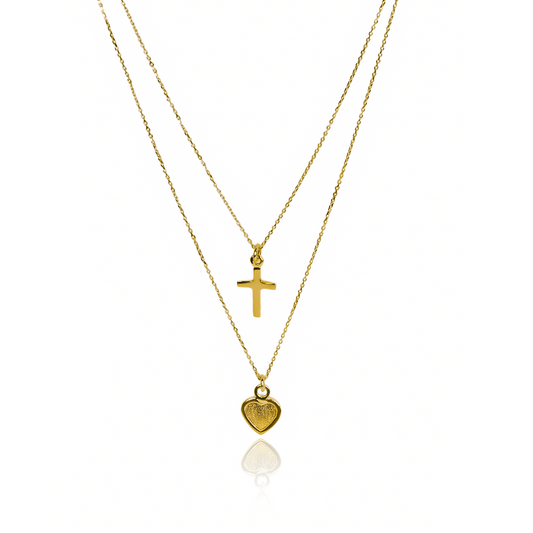 La gargantilla Cross &amp; Heart es una pieza de joyería de alta calidad bañada en oro de 18K. Diseñada por Joyería Caracas, esta elegante gargantilla es el complemento perfecto para cualquier atuendo, brindando un toque sofisticado y exclusivo. Con garantía de por vida, es una inversión que durará para siempre.