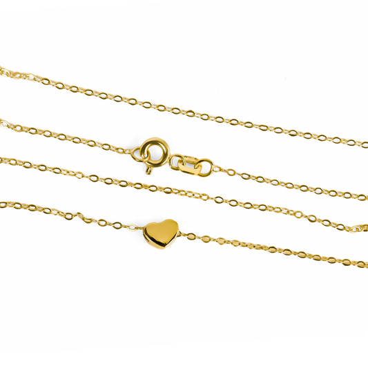 La gargantilla classic corazón pasante S es una pieza de joyería exclusiva de oro 18K de la marca Joyería Caracas. Con un diseño clásico y elegante, esta gargantilla cuenta con la garantía de por vida de Joyería Caracas, por lo que podrás lucirla con estilo y confianza.