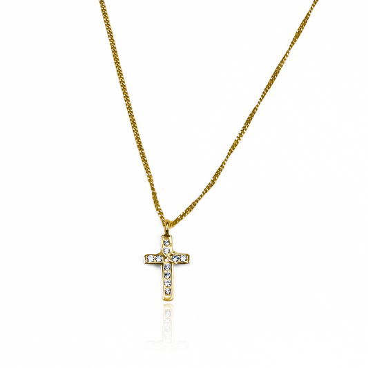 Con la gargantilla cruz mini cubana de oro 18K de Joyería Caracas, siempre tendrás una pieza elegante y exclusiva en tu colección. Con garantía para toda la vida, esta joya es símbolo de lujo y calidad. Completa tu estilo con un toque de sofisticación y distinción.