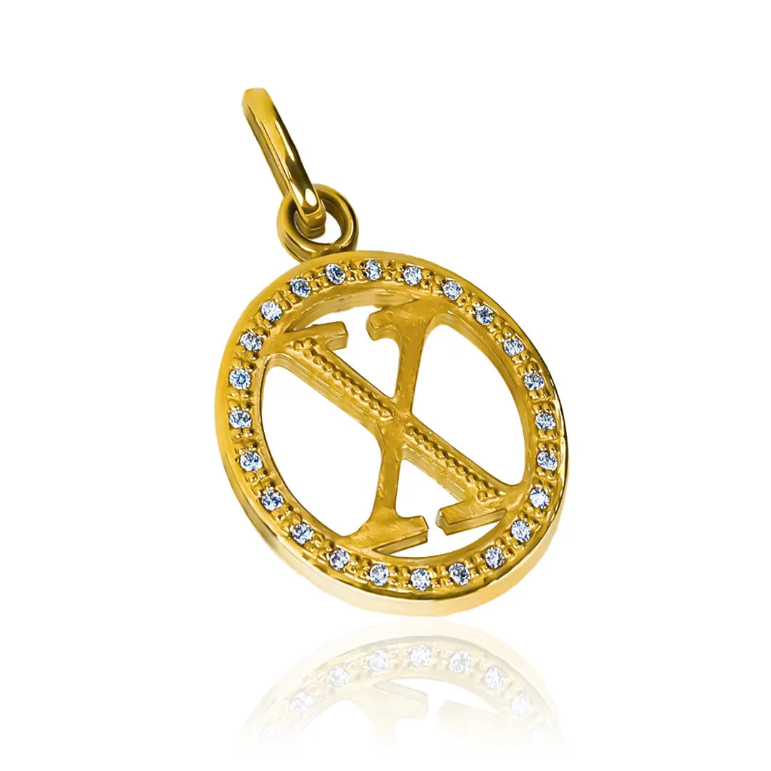 Dije de la letra X, hecho de oro 18K y cristal JC, es una joya de Joyería Caracas con garantía de por vida.