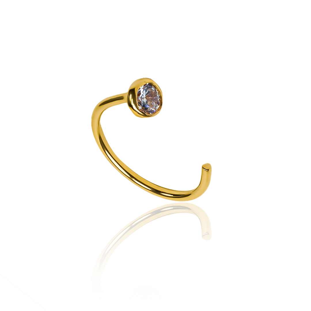 Añade un toque de elegancia a tu estilo con nuestro Piercing Cristal de Oro 18K de la prestigiosa Joyería Caracas. Con garantía de por vida, este piercing es una inversión atemporal en tu belleza. Haz una declaración de sofisticación con nuestro Piercing Cristal de calidad suprema.