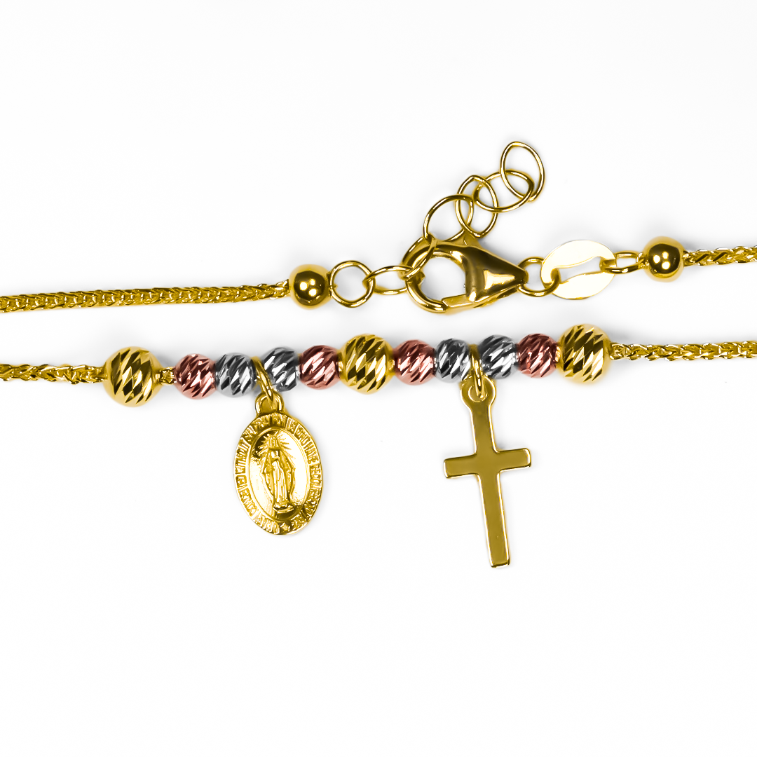 Luce con elegancia y exclusividad con nuestra Pulsera 3 oros Guadalupe cruz I. Hecha de oro 18K por Joyería Caracas, ofrece una garantía de por vida. Una pieza única que combina sofisticación y protección, inspirada en la icónica Guadalupe.