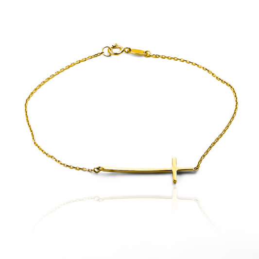 Descubre la elegancia y exclusividad de la Pulsera Cruz I de Joyería Caracas. Elaborada en Oro 18K, esta pulsera es un símbolo de estilo y distinción. Con garantía para toda la vida, es una joya que te acompañará por siempre. Adquiere la tuya ahora.